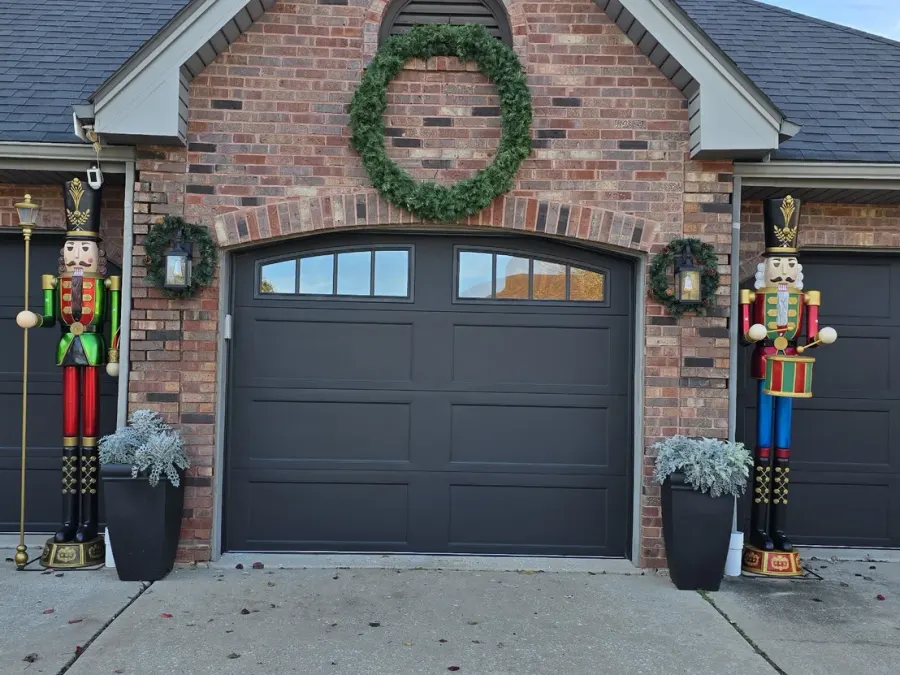 Three Clopay Bridgeport Steel garage doors in Lustra Black