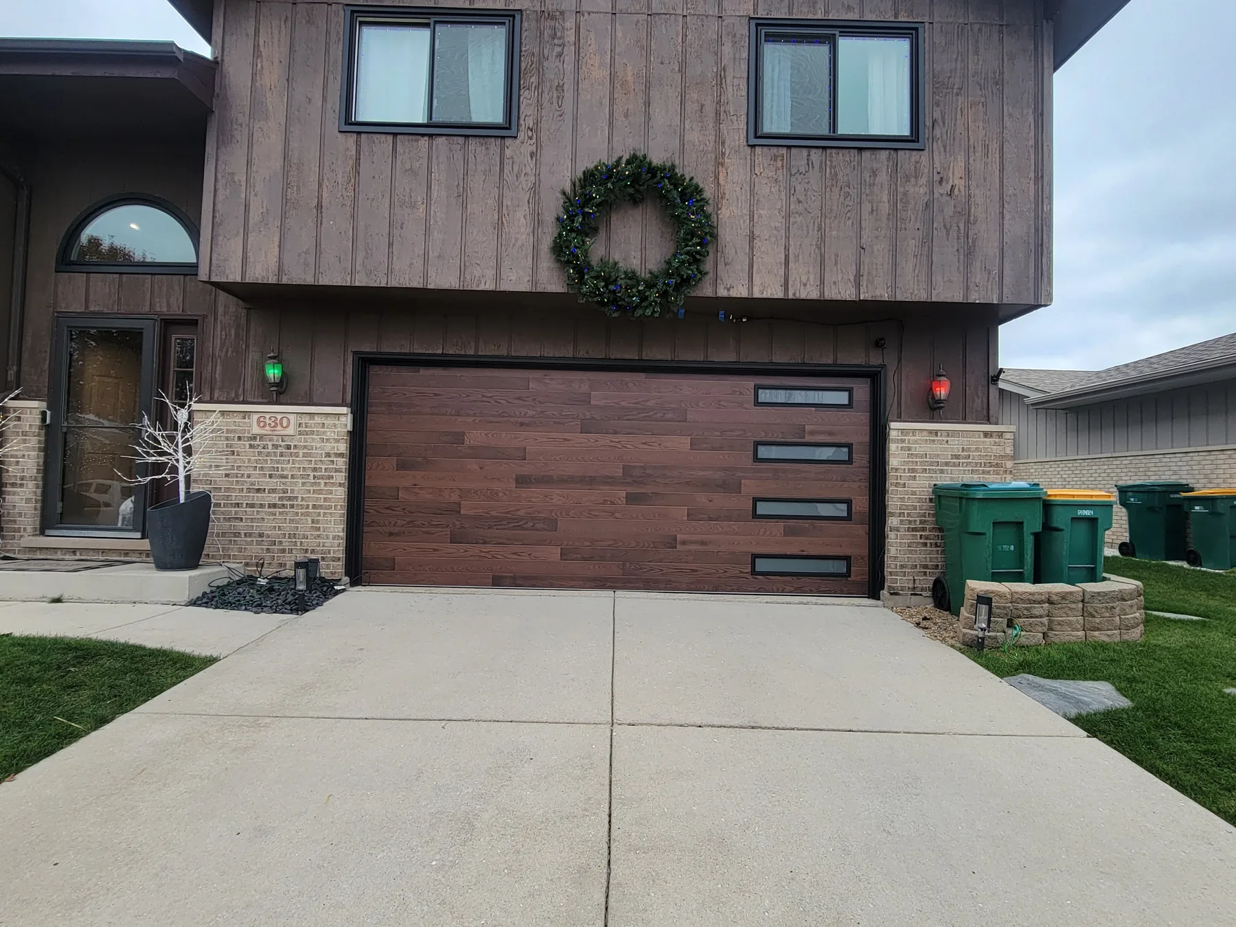 Clopay Modern Steel Kona Plank garage door with horizontal windows