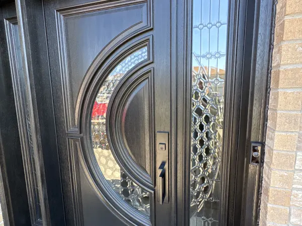 Black entry door with full sidelights, classic design