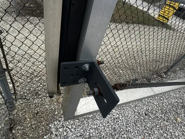 Cantilever slide gate operator with v-track