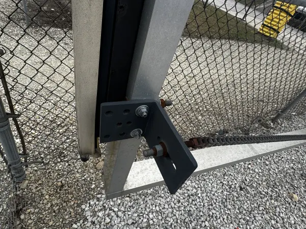 Cantilever slide gate operator with v-track