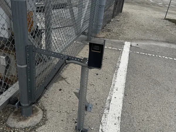 Slide-gate operator on a commercial chain-link gate