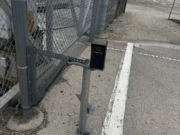 Slide-gate operator on a commercial chain-link gate
