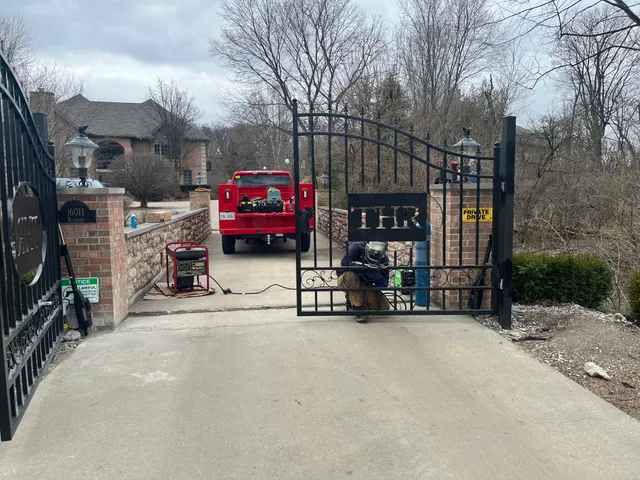 On-site welding work for a custom THR monogram on dual ornamental swing gates. Truck-stocked tools, generator, and a tech who handles the metal work — not just the motor.