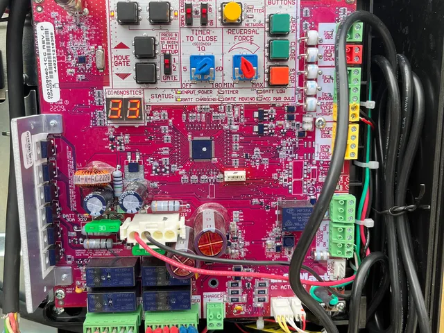 Diagnosing the brain of an automatic gate operator — the part most door companies will not touch. We read fault codes, swap relays, and replace boards on the truck.