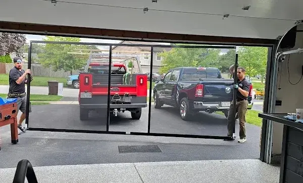 Interior view of a Lifestyle Screen installed across a garage opening