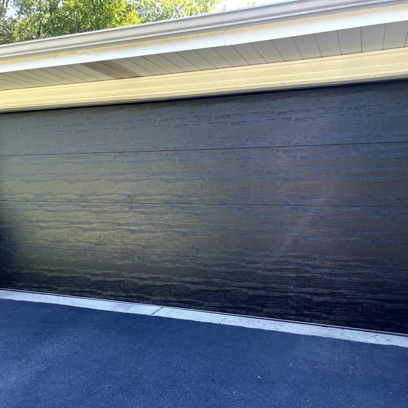 Contemporary black garage door install, the Chicago Suburbs