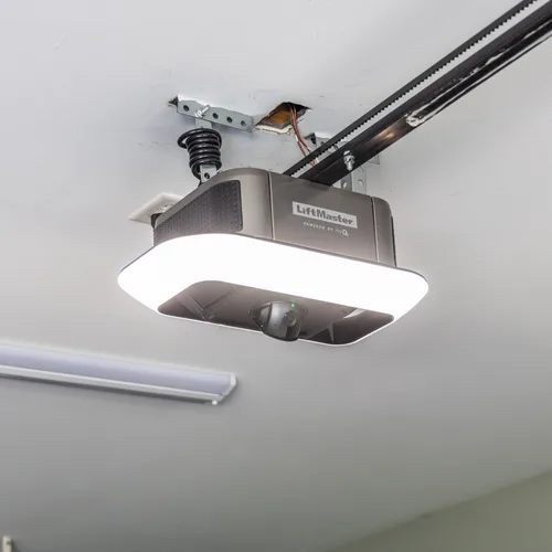 LiftMaster garage door opener installed and rail-mounted in a residential garage