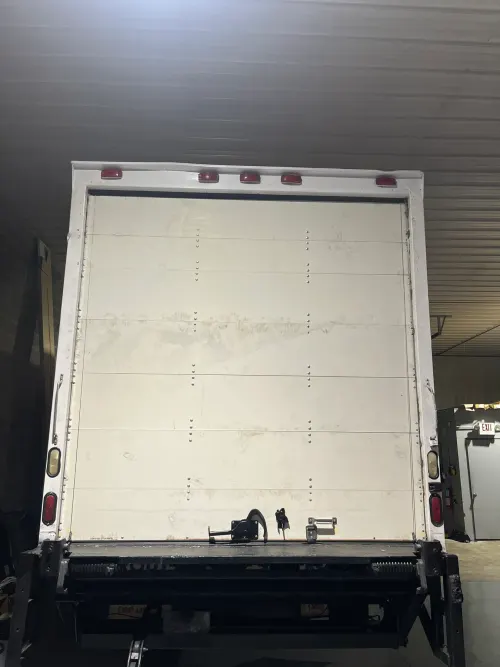 Roll-up cargo door viewed from inside the truck after install