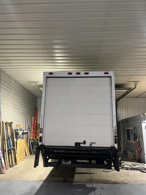 Retracted roll-up door from inside a freshly serviced box truck