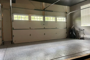 inside-the-white-garage-door with visible garage door sensors at near bottom