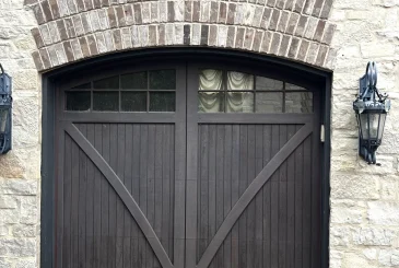 the-small-garage-door-with-windows-in-the-old-and-cozy-house