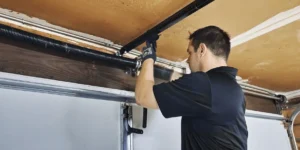 man-repairing-and-fixing-a-garage-door