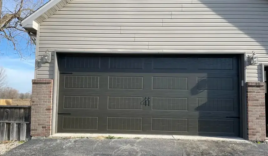 a garage with a brick wall