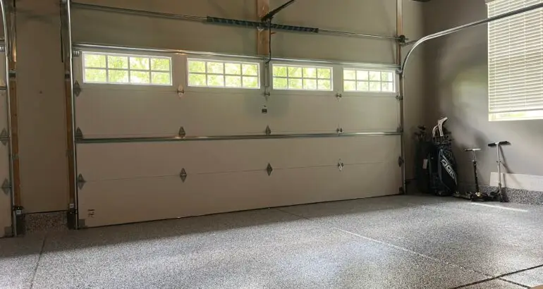 inside-the-white-garage-door with visible garage door sensors at near bottom