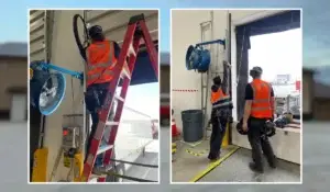 Technicians performing commercial overhead door installation and repair services in New Lenox