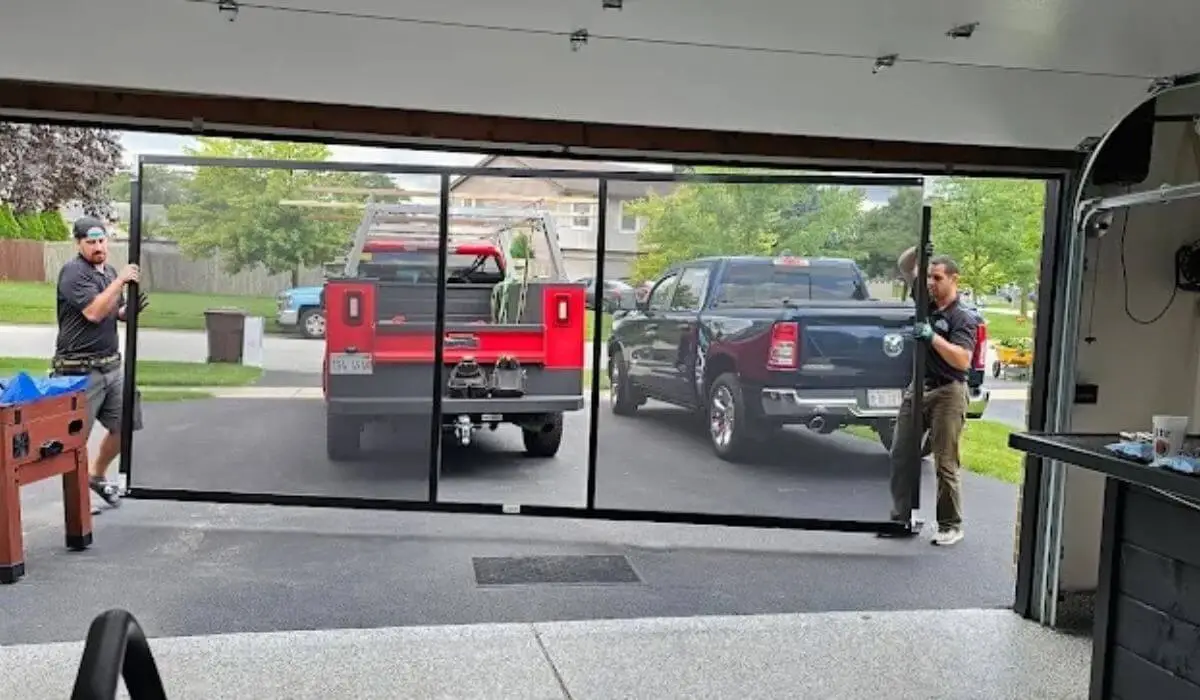 Technician adjusting garage door opener repair mechanics for optimal performance.